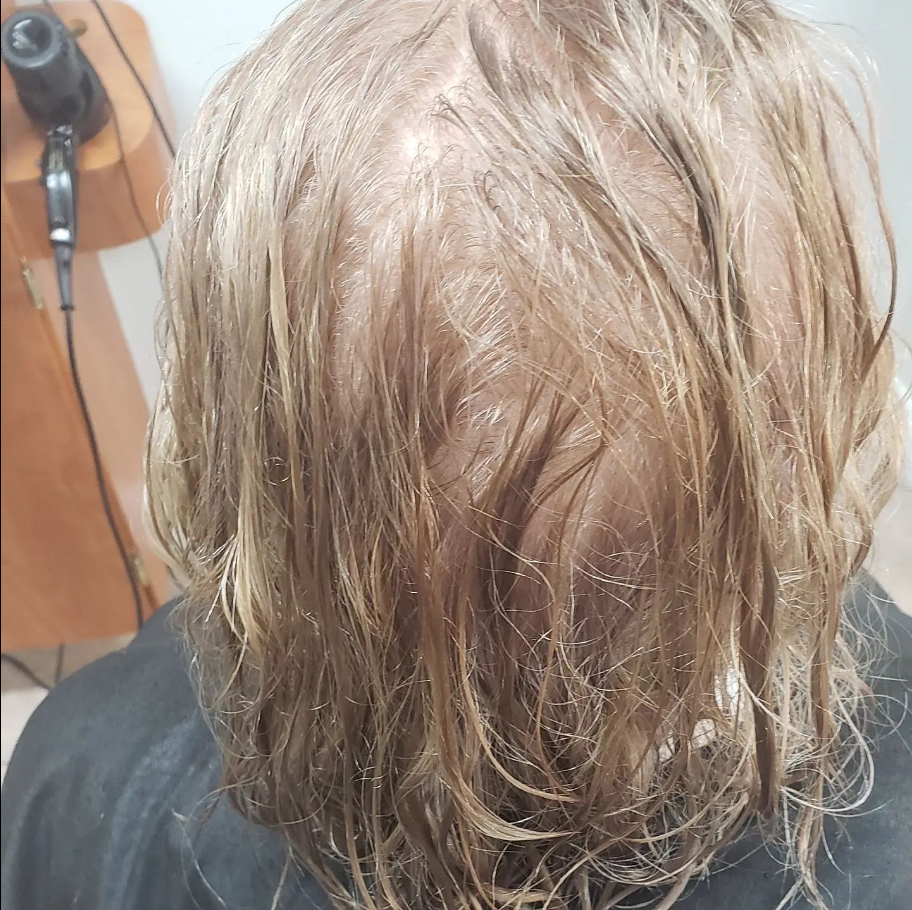 Client hair before treatment - damaged and thinning texture